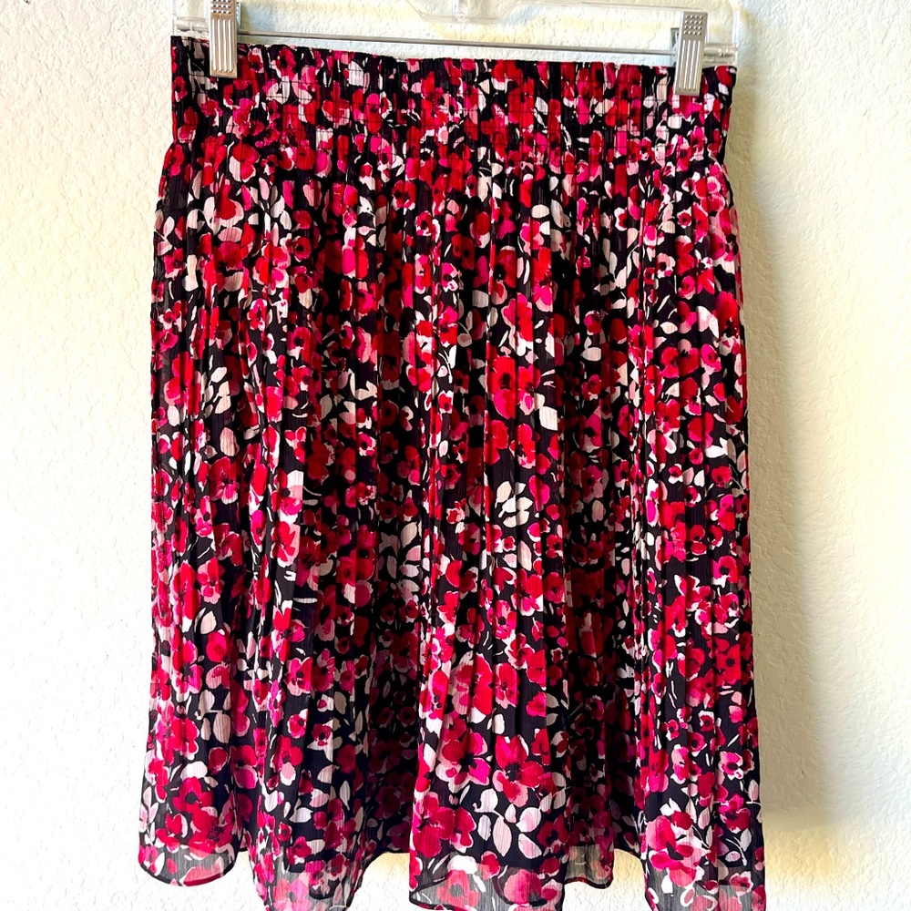 Navy and berry colored floral mesh short skirt. Size XS